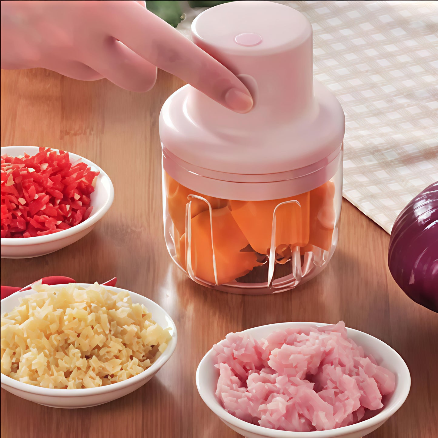 A mini food processor designed for chopping garlic, vegetables, and other small food items.